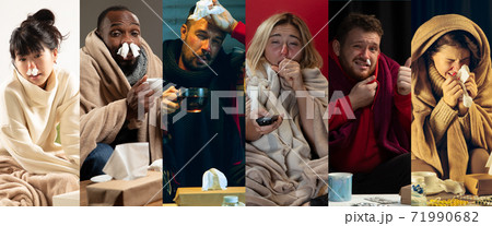 Young people wrapped in a plaid looks sick, ill, sneezing and coughing sitting at home indoors Young people wrapped in a plaid looks sick, ill, sneezing and coughing sitting at home indoors 71990682