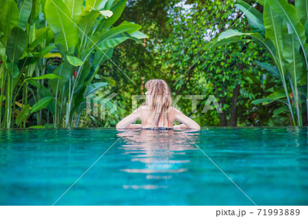 Beautiful young woman dressed in swimsuit Beautiful young woman dressed in swimsuit 71993889