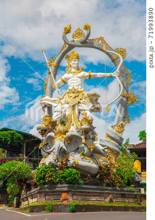 Traditional statue of the deity Arjuna 71993890