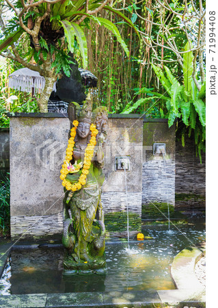 Traditional balinese statue Dewi Danu 71994408