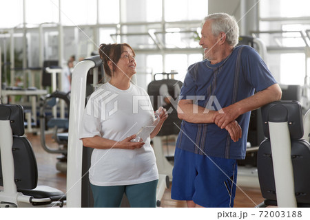 Happy senior couple at gym. Happy senior couple at gym. 72003188