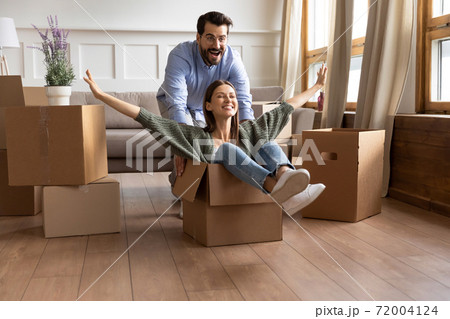 Happy coupler ride in boxes have fun on moving day Happy coupler ride in boxes have fun on moving day 72004124