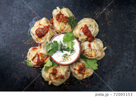 Traditional Uzdek manti steamed with mincemeat with tartar  72005153