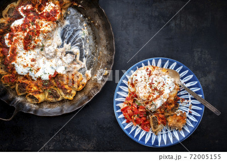 Traditional Uzdek manti steamed with mincemeat with tartar  72005155