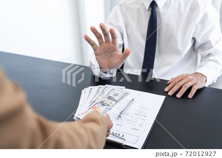 Businessman partner hand gesture rejecting refusing money, anticorruption concept. 72012927