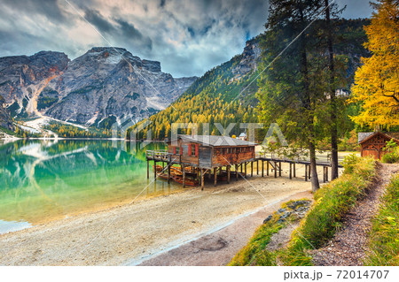 Spectacular wooden boathouse on the alpine lake,Dolomites,Italy,Europe 72014707