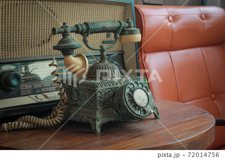 Old telephone retro rotary phone antique style in vintage room 72014756