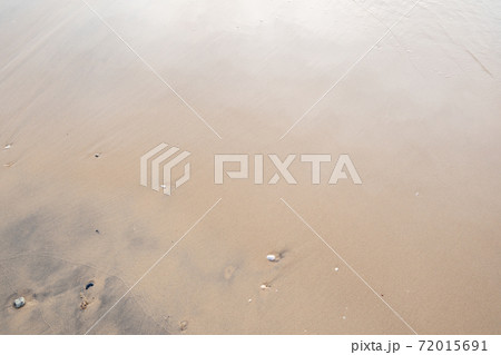 Close up of sand texture on the beach for Summer background and summer nature design. Close up of sand texture on the beach for Summer background and summer nature design. 72015691