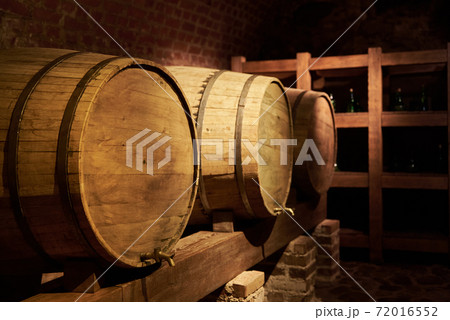 Two wine barrels in old wine cellar Two wine barrels in old wine cellar 72016552