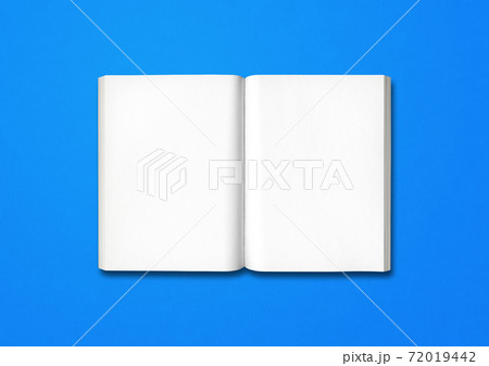 Open Book Isolated On Blueの写真素材