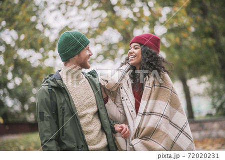 Man and woman smiling and joking during the date 72020231
