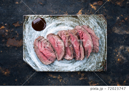 Japanese barbecue wagyu dry aged fillet steak slices  72023747