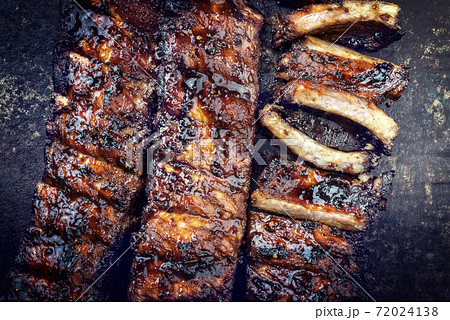 Barbecue spare ribs St Louis style with hot honey chili marinade Barbecue spare ribs St Louis style with hot honey chili marinade 72024138