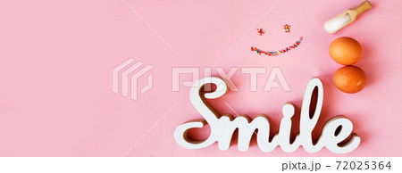 Ingredients for cooking baking - egg, sugar culinary topping on pink background. Concept of cooking dessert. banner 72025364