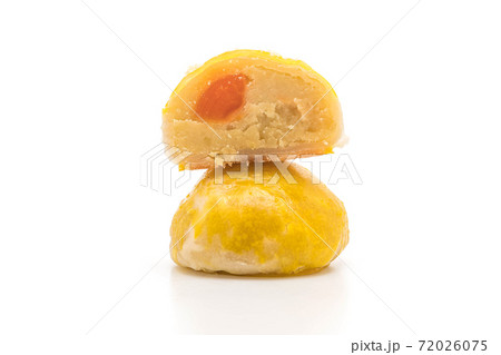 Chinese pastry or moon cake filled with mung bean paste and salted egg yolk Chinese pastry or moon cake filled with mung bean paste and salted egg yolk 72026075
