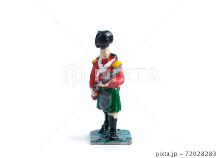 Image of vintage tin soldier's figurine on the white background 72028283