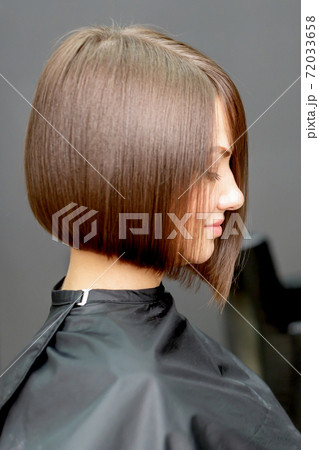 Woman with short hairstyle. 72033658