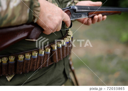 Hunting Equipment Ammunition on Waist of Hunter. Hunting Equipment Ammunition on Waist of Hunter. 72033865