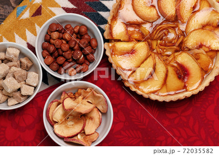 Top view of apple tart pie on tablecloth Top view of apple tart pie on tablecloth 72035582