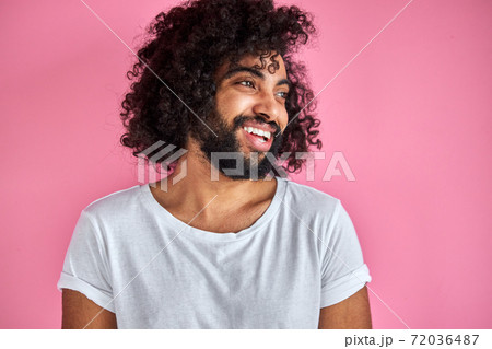 happy man cheerfully smiling isolated in studio happy man cheerfully smiling isolated in studio 72036487