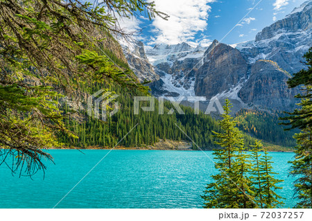 Moraine lake beautiful landscape in summer to early autumn sunny day morning. Sparkle turquoise blue water, snow-covered Valley of the Ten Peaks. Banff National Park, Canadian Rockies, Alberta, Canada Moraine lake beautiful landscape in summer to early autumn sunny day morning. Sparkle turquoise blue water, snow-covered Valley of the Ten Peaks. Banff National Park, Canadian Rockies, Alberta, Canada 72037257