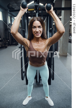 fitness woman pumping up butt booty legs muscles Stock Photo