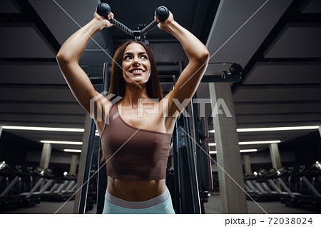 fitness woman pumping up butt booty legs muscles - Stock Photo