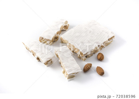 Christmas nougat isolated on white background. Typical spanish dessert Christmas nougat isolated on white background. Typical spanish dessert 72038596