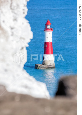 Beachy Head Lighthouse with chalk cliffs near the Eastbourne, East Sussex, England 72039791