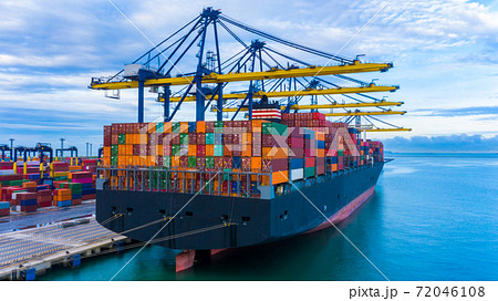 Aerial view port shipping, Container ship at port with crane port, Container ship carrying container import and export business logistic and transportation, Cargo freight shipping import export Aerial view port shipping, Container ship at port with crane port, Container ship carrying container import and export business logistic and transportation, Cargo freight shipping import export 72046108