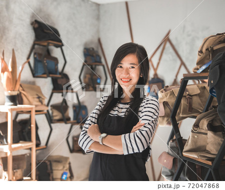 female business owner in a bag shop 72047868