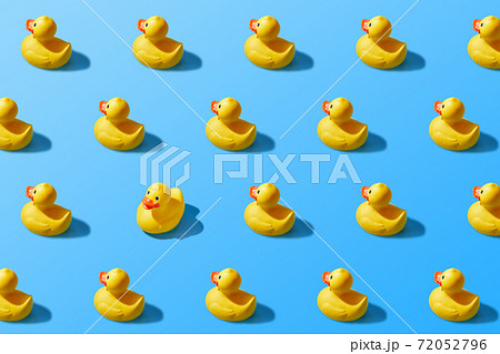 Trendy pop art design of a yellow rubber duck pattern from a top view. Dissenting opinion, chosen one, not like everyone else. Trendy pop art design of a yellow rubber duck pattern from a top view. Dissenting opinion, chosen one, not like everyone else. 72052796