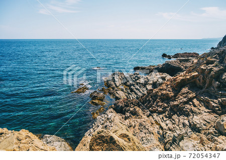 Seascape of a steep rocky coast Seascape of a steep rocky coast 72054347