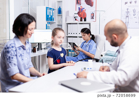 Nurse using tablet pc 72058699