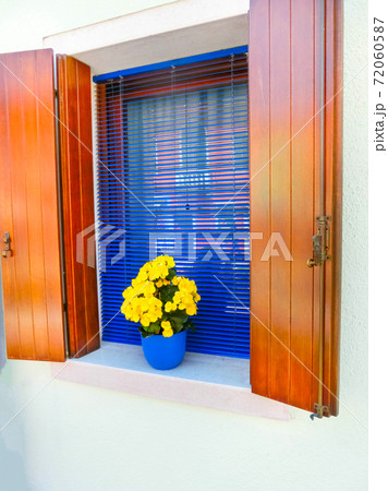 Colorful window at house on the Island Burano Colorful window at house on the Island Burano 72060587