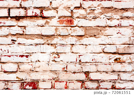 Texture of a brick wall with cracks and scratches which can be used as a background 72061551