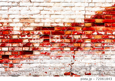 Texture of a brick wall with cracks and scratches which can be used as a background Texture of a brick wall with cracks and scratches which can be used as a background 72061843