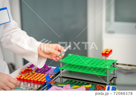 Prepare tools for blood sampling 72066378