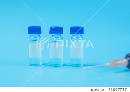 Vaccine vial dose with shot drug needle syringe in hospital laboratory. Medical, health, Vaccination and immunization concept 72067737