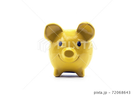 Closeup of yellow piggy bank on white background Closeup of yellow piggy bank on white background 72068643