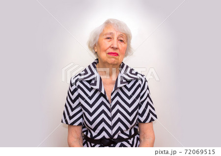Elderly serious woman 72069515