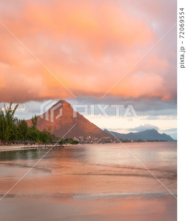 Flic en Flac beach and the mountain Tourelle du Tamarin at sunset Flic en Flac beach and the mountain Tourelle du Tamarin at sunset 72069554