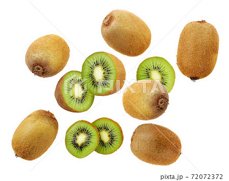 Kiwi whole and half falling on a white background. Isolated Kiwi whole and half falling on a white background. Isolated 72072372