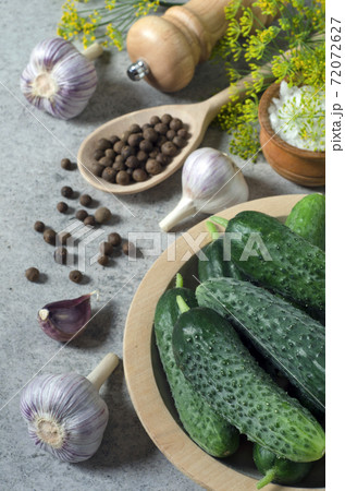 Ripe cucumbers and spices for pickling 72072627