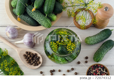 Jar cucumbers and ingredients for pickles 72074312
