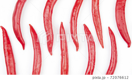 Red hot chili peppers on a white background. food figures. Vitamin vegetable food 72076612