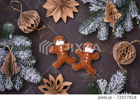 Gingerbread man from felt in face mask 72077828