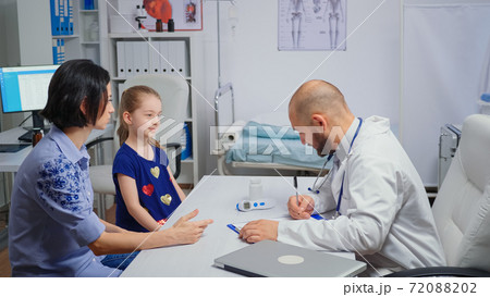 Doctor changing the treatment 72088202