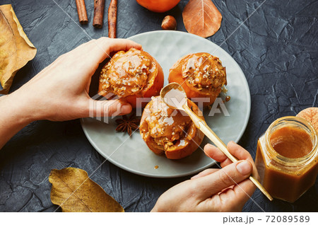 Baked stuffed persimmon 72089589