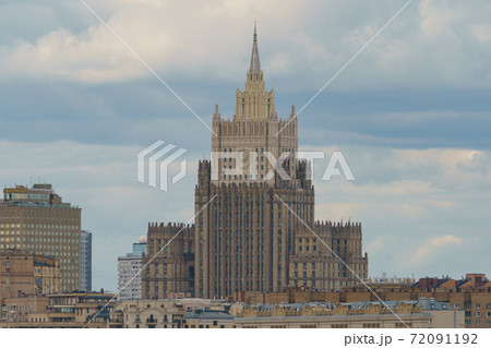 Moscow cityscape within day time. Offices buildings exterior. Rooftops of residential houses. Cloudy sky. Overcast day. High angle view.. Ministry of Foreign Affairs 72091192